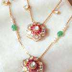 14K gold necklace with floral Polki pendants and emerald beads