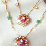 14K gold necklace with floral Polki pendants and emerald beads