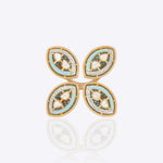 18k gold floral ring with a medley of Polki and fine-cut diamonds.