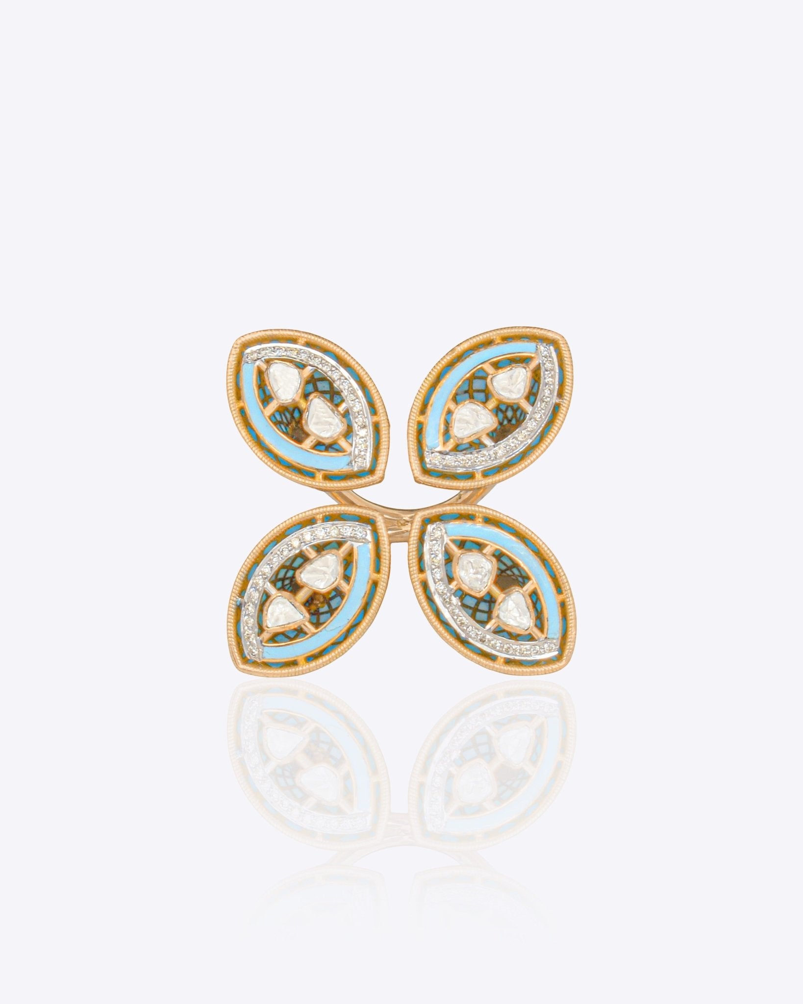 18k gold floral ring with a medley of Polki and fine-cut diamonds.