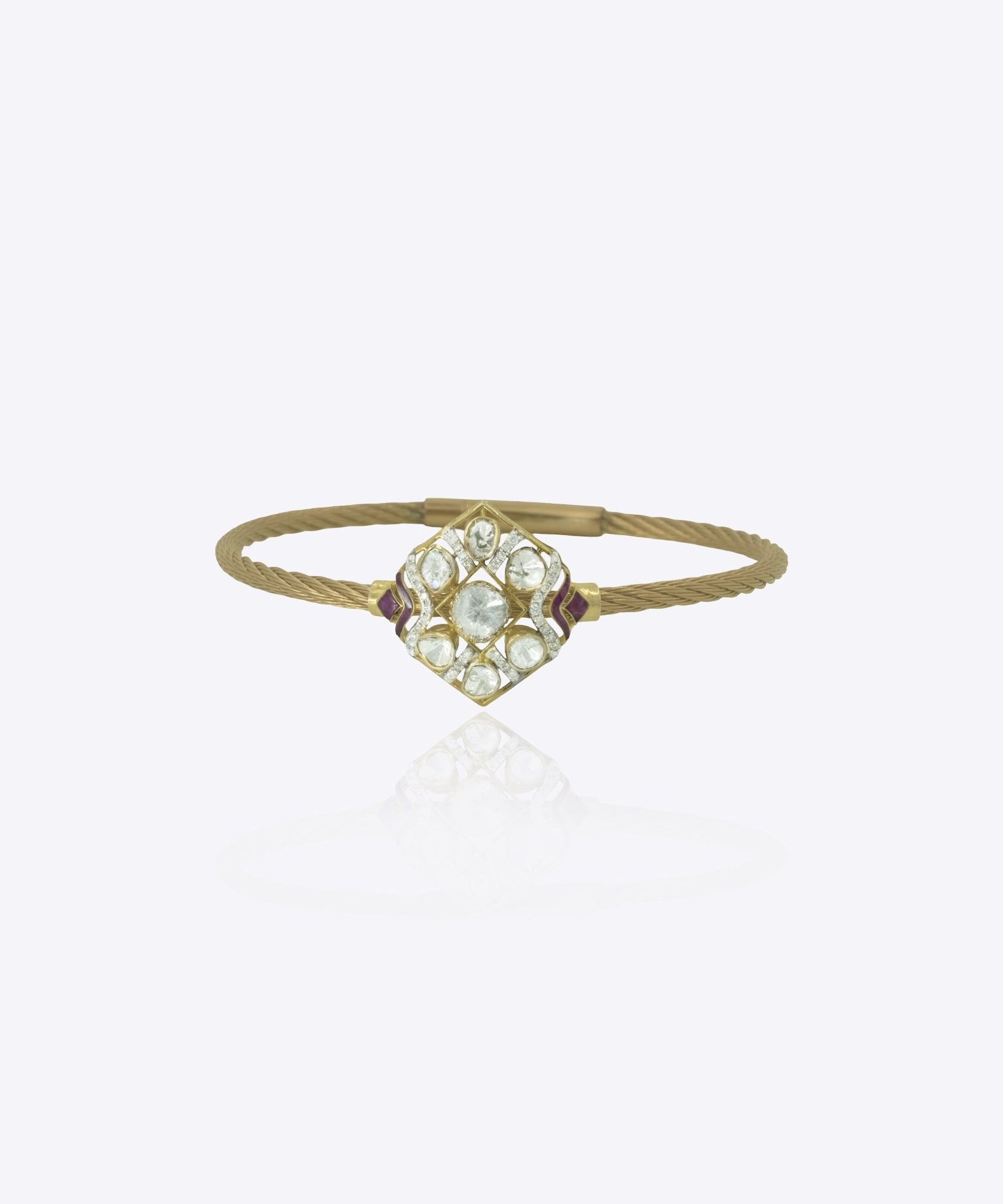 9k gold sculpted bracelet with radiating Polki cluster centerpiece