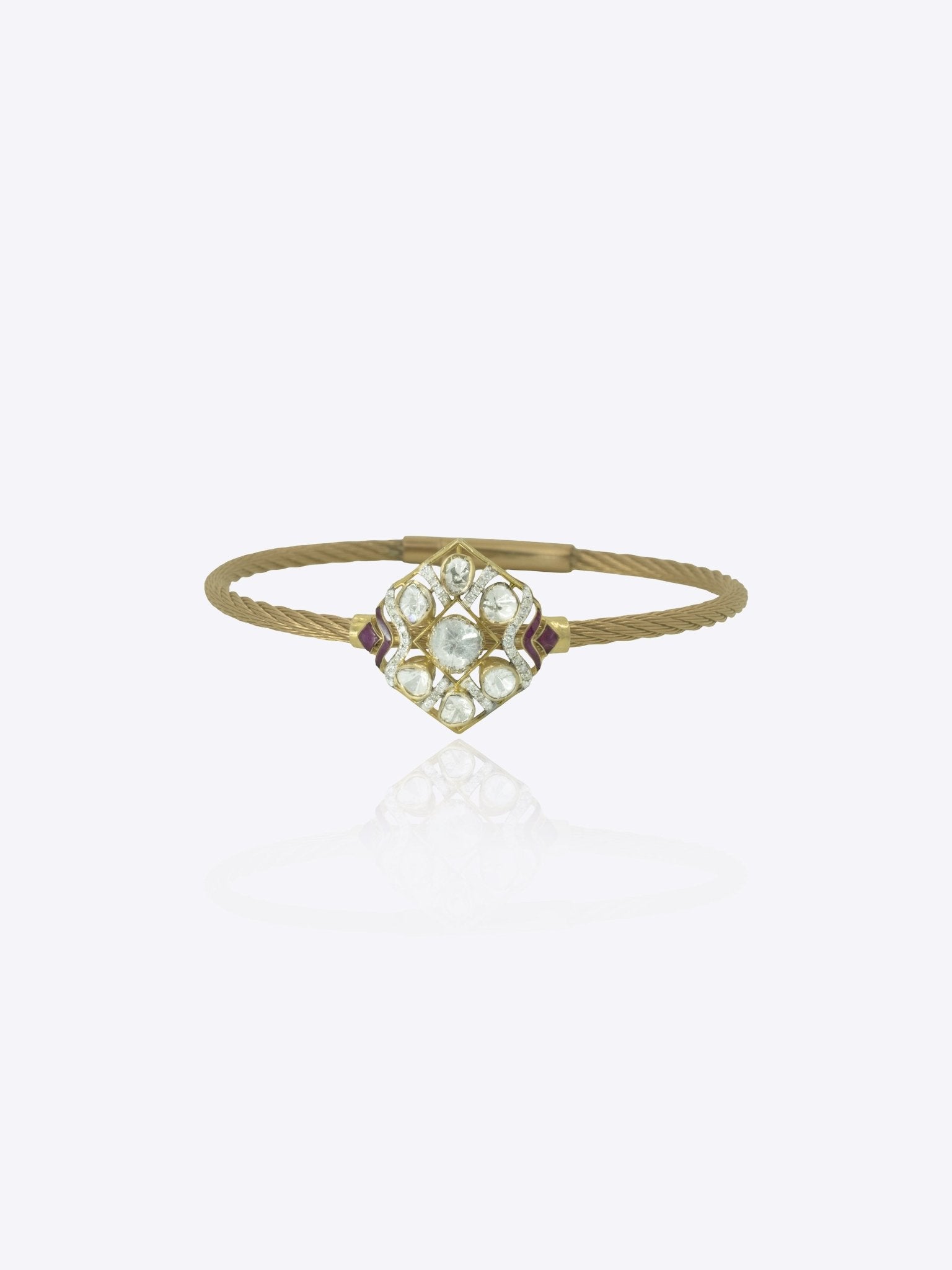 9k gold sculpted bracelet with radiating Polki cluster centerpiece