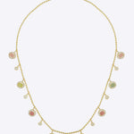 The Gemline Necklace in 18K gold with soft-toned tourmaline drops.