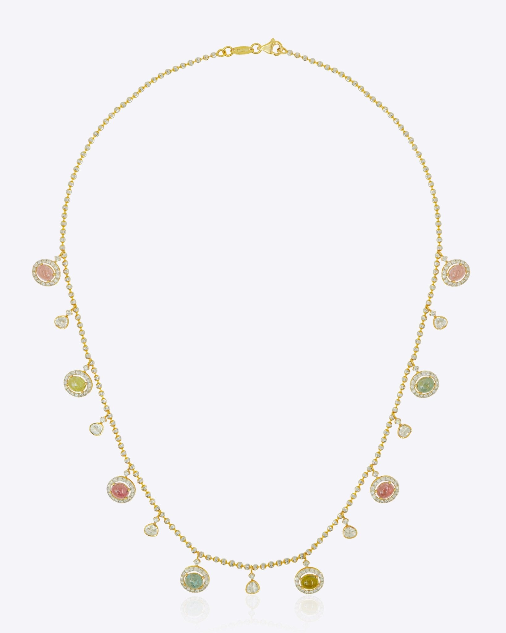 The Gemline Necklace in 18K gold with soft-toned tourmaline drops.