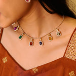 Heritage Hue Necklace in 14K gold with nine rectangular gemstones and Polki diamonds.