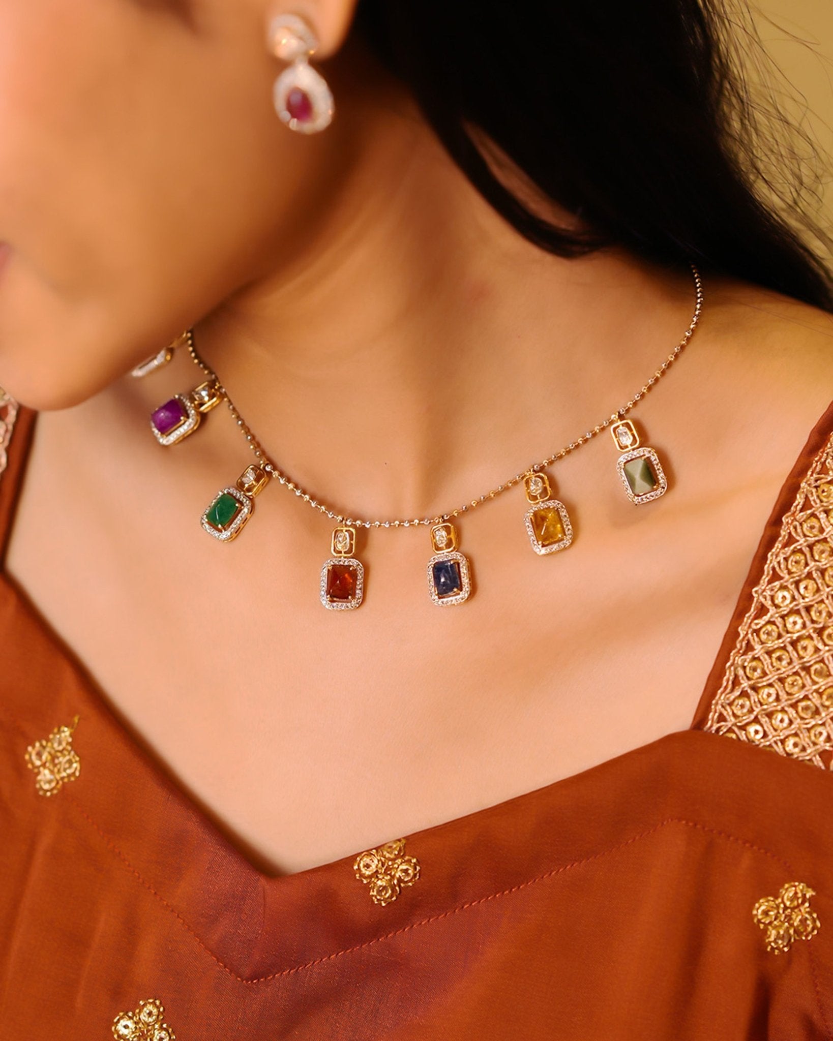 Heritage Hue Necklace in 14K gold with nine rectangular gemstones and Polki diamonds.