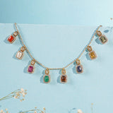 Heritage Hue Necklace in 14K gold with nine rectangular gemstones and Polki diamonds.