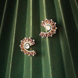 14K gold curved stud earrings with blush gemstones and Polki diamonds.