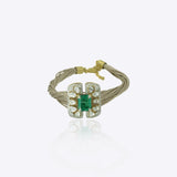 9k gold Glinting Hive bracelet with rectangular emerald centerpiece and refine Polki wings