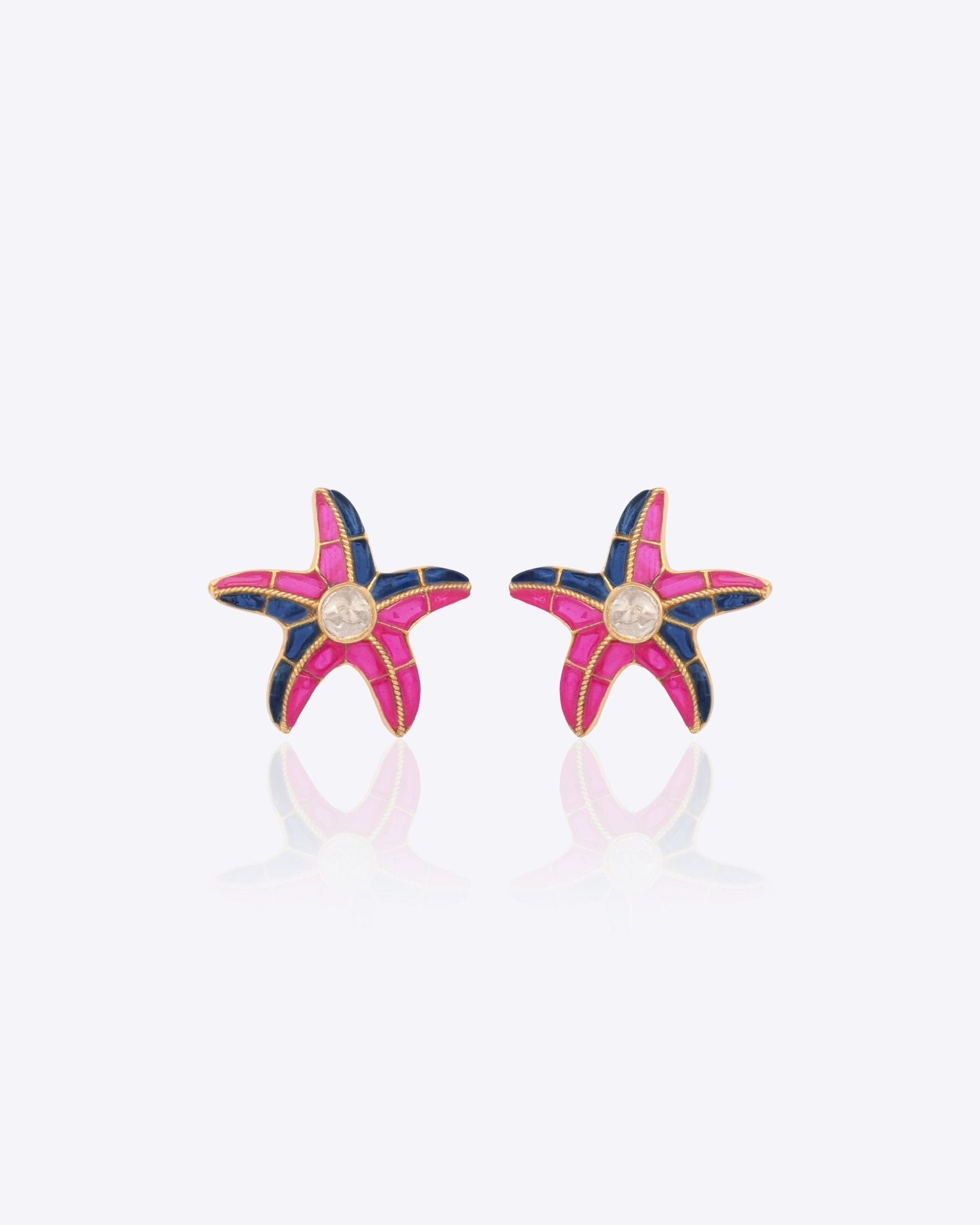 Stellar Starfish Earrings in 14K gold with uncut Polki diamonds in pink and blue.