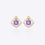 9k gold Orchid Halo earrings with soft curves and violet center stone