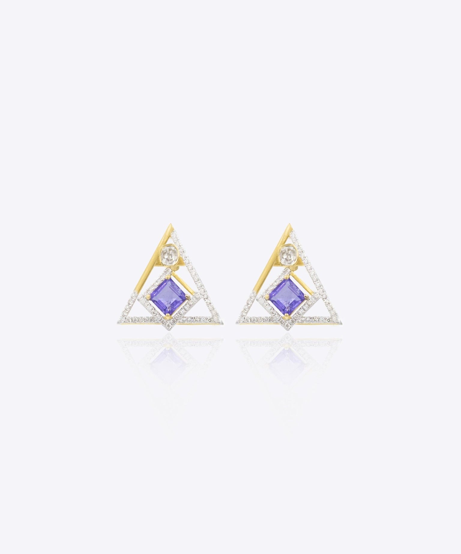 Radiant Triad Polki earrings with luminous center stone and elegant openwork design