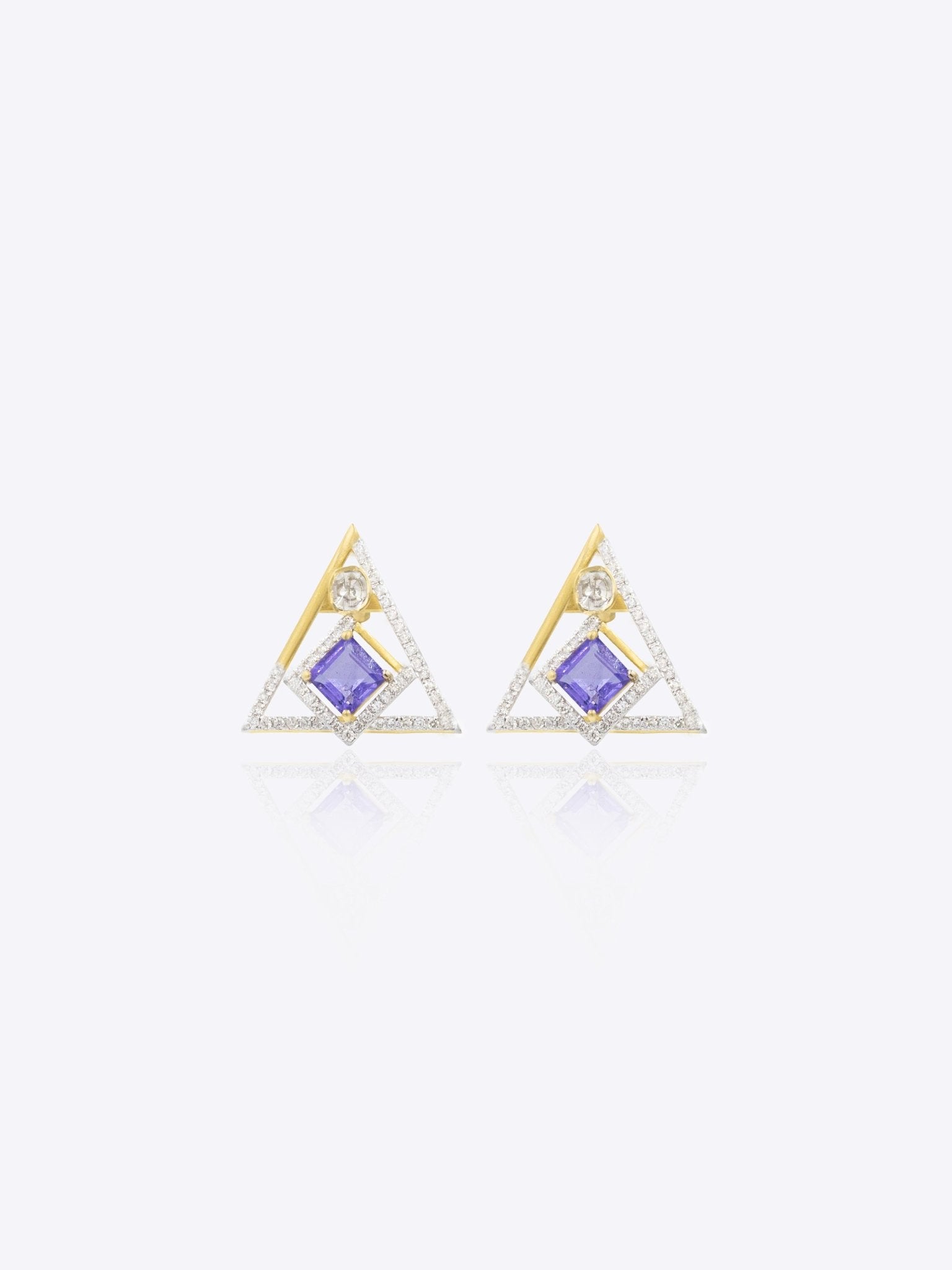 Radiant Triad Polki earrings with luminous center stone and elegant openwork design
