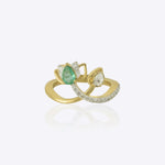 Sovereign Lotus Ring in 9k gold with a lotus pearl motif and Polki-encrusted wing