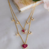 Sweetheart Necklace in 14k gold with a pink heart pendant on a double chain.