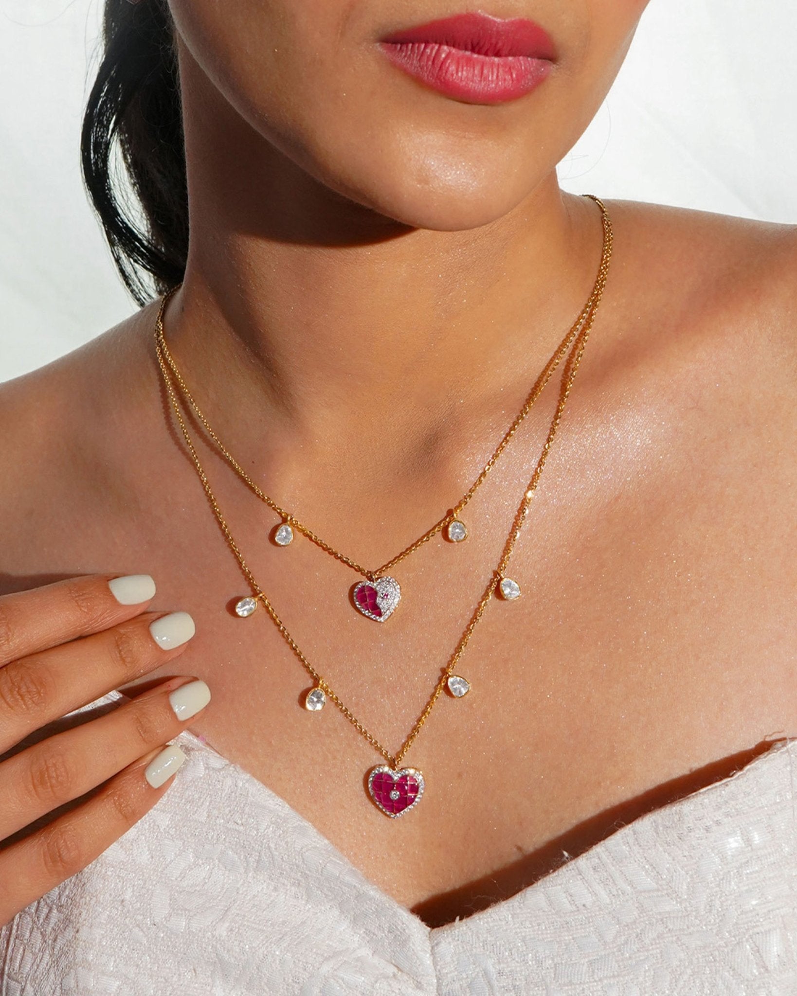 Sweetheart Necklace in 14k gold with a pink heart pendant on a double chain.