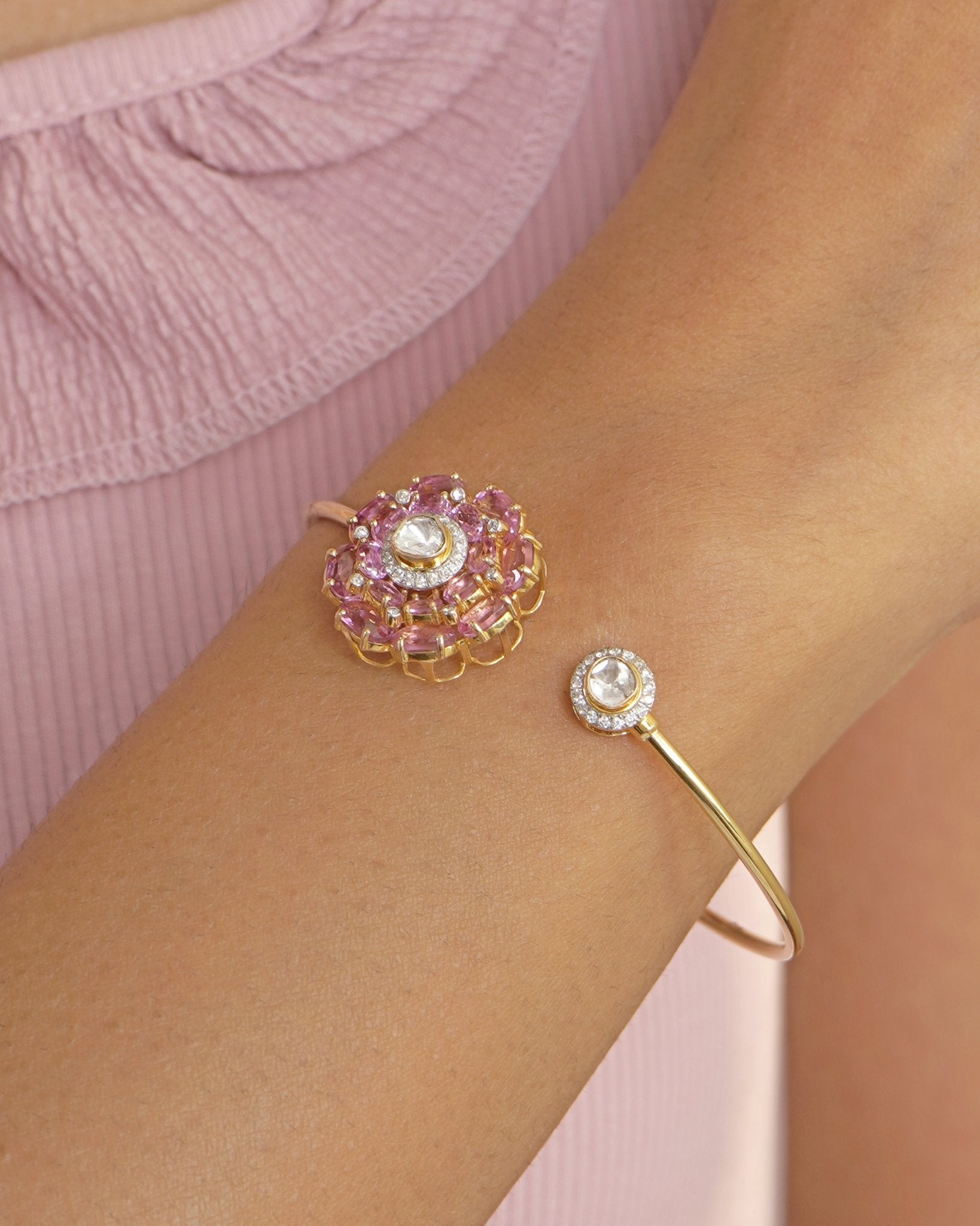 Gold Pink Camellia Bangle with a radiant floral Polki motif and open-cuff design.