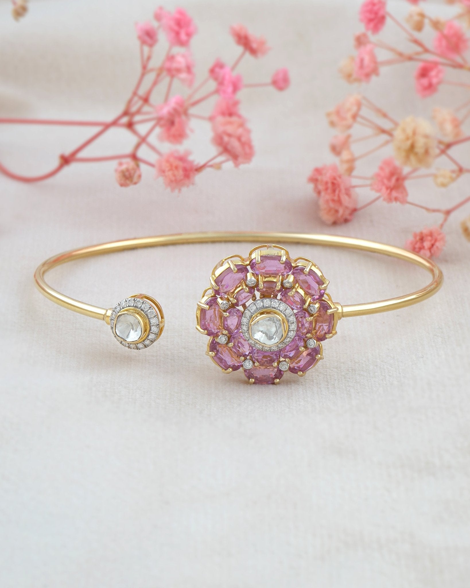 Gold Pink Camellia Bangle with a radiant floral Polki motif and open-cuff design.