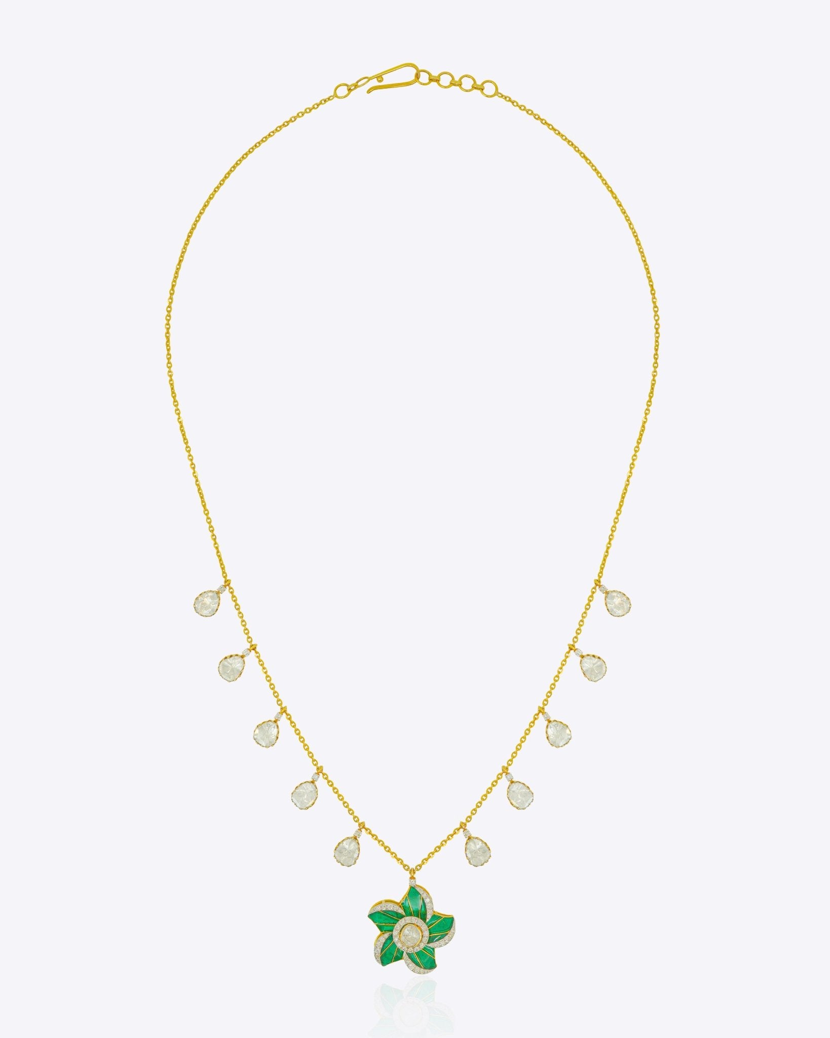 14K gold necklace with sculpted branch motifs and delicate drops