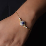 14k gold bracelet with an Evil Eye motif in Polki and diamonds