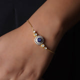 14k gold bracelet with an Evil Eye motif in Polki and diamonds