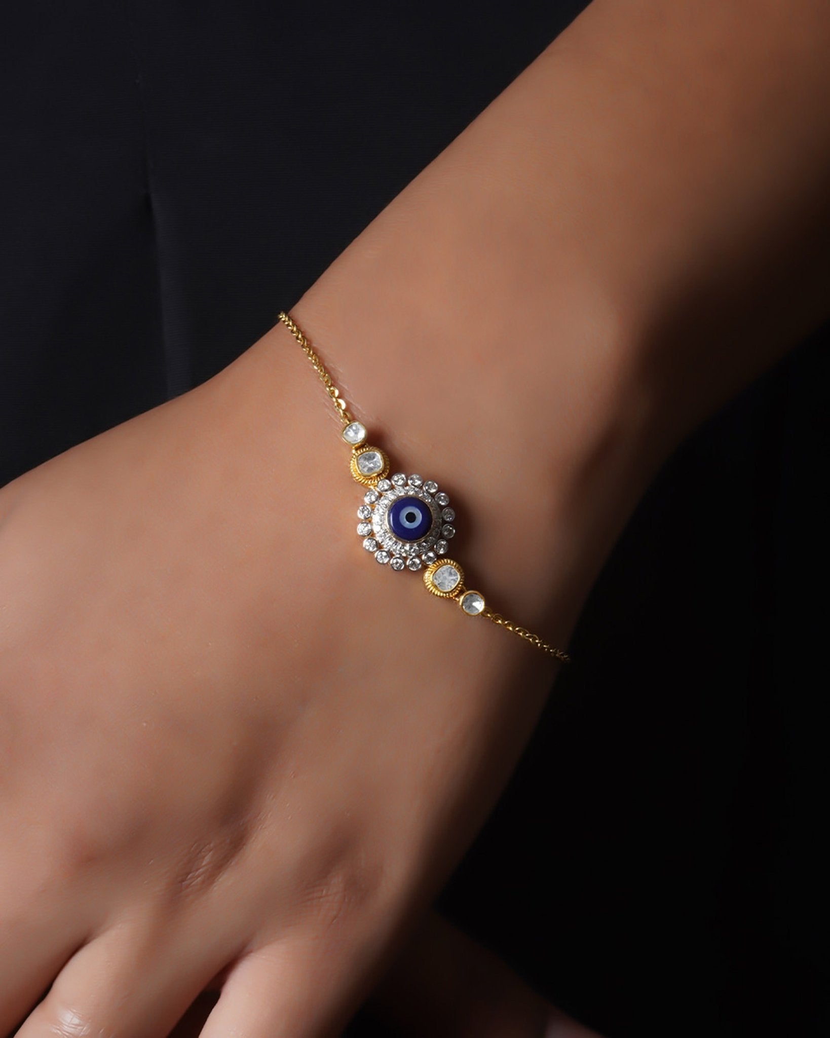 14k gold bracelet with an Evil Eye motif in Polki and diamonds