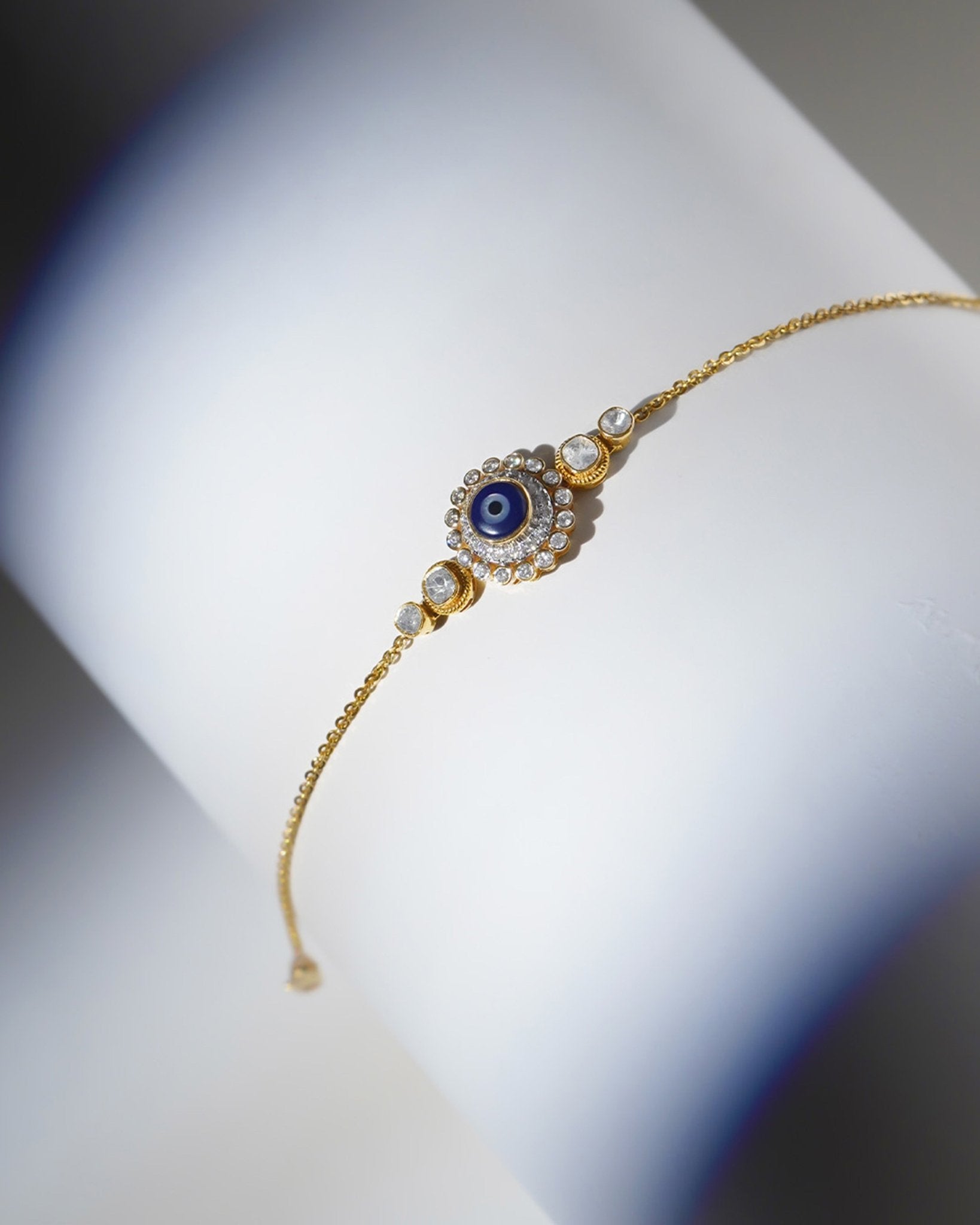 14k gold bracelet with an Evil Eye motif in Polki and diamonds