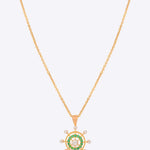Whimsy Wheel Pendant in 14K gold with vibrant green centrepiece and Polki diamond spokes.