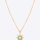 Whimsy Wheel Pendant in 14K gold with vibrant green centrepiece and Polki diamond spokes.