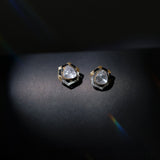 Ringlet Polki Studs in 14K gold with an oval polki and gold halo