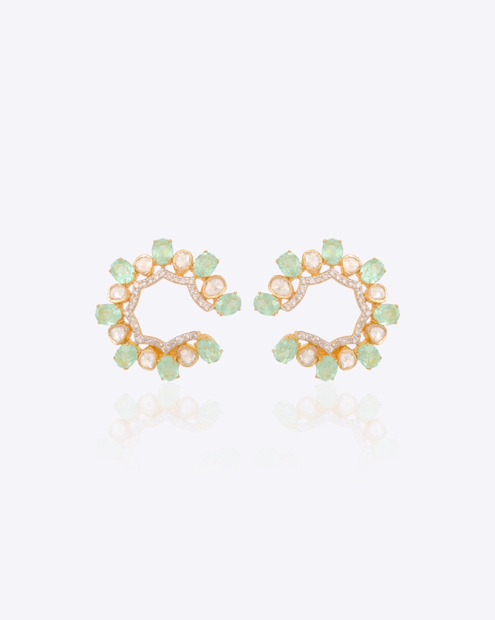 14k gold stud earrings with green gemstones, Polki, and diamonds.