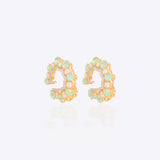 14k gold stud earrings with green gemstones, Polki, and diamonds.