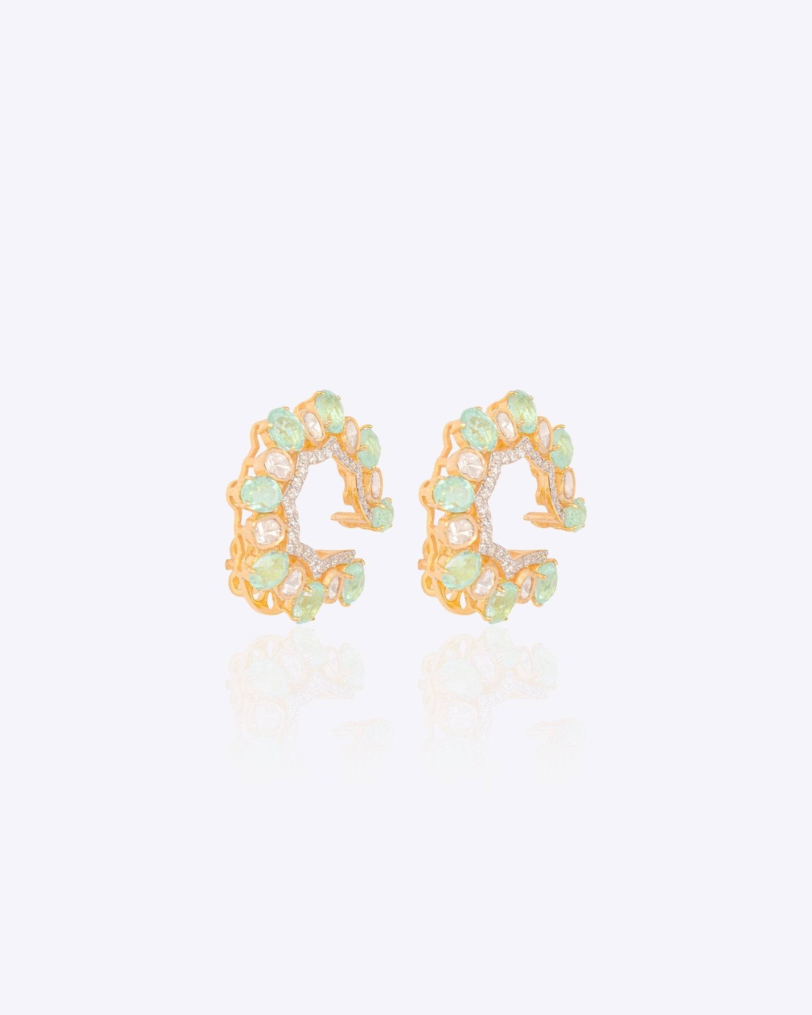 14k gold stud earrings with green gemstones, Polki, and diamonds.