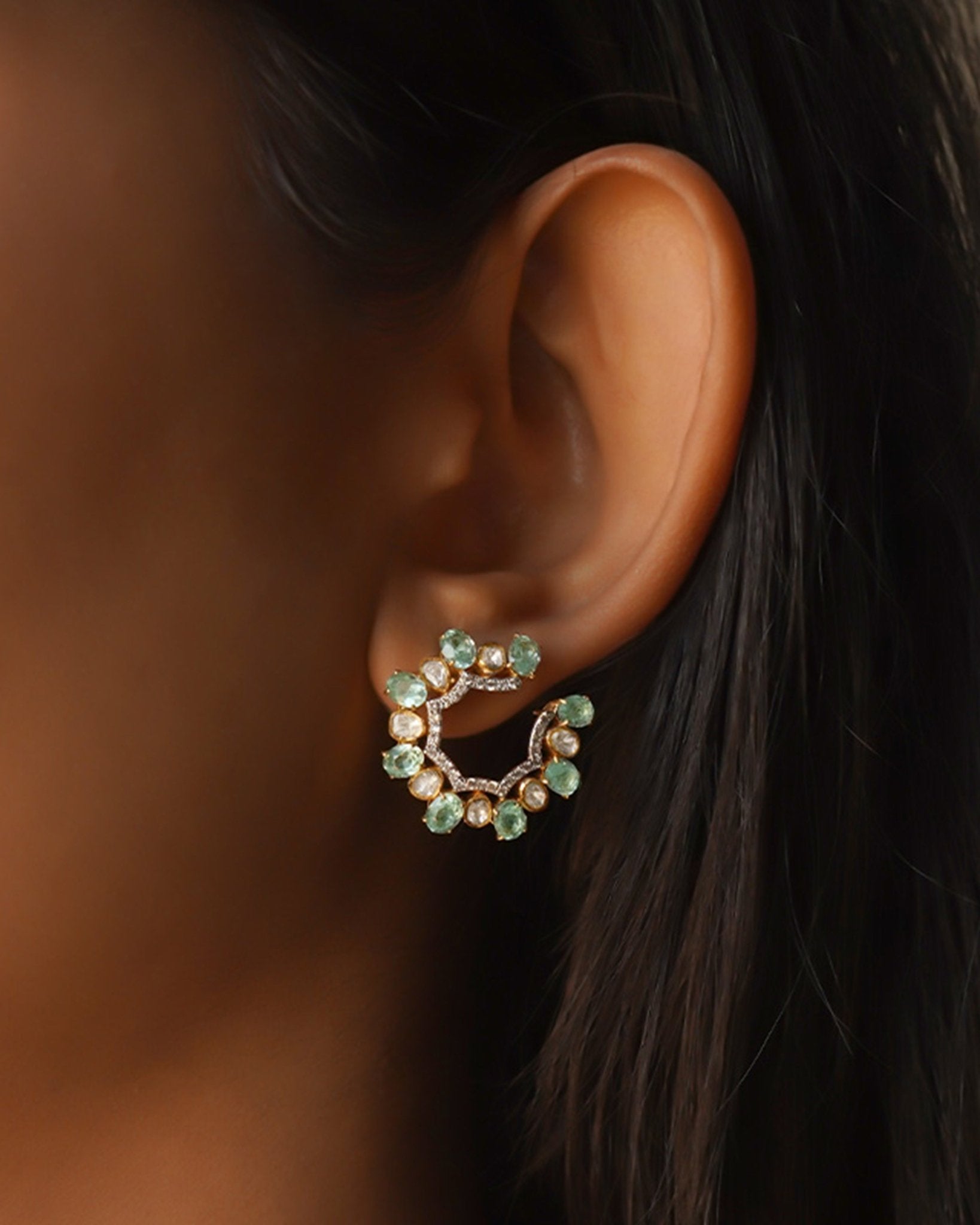 14k gold stud earrings with green gemstones, Polki, and diamonds.