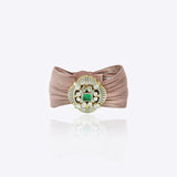 9k gold bracelet with oval fine Polki centerpiece and blush pink mesh threading