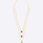 14K gold necklace with layered Polki, pearls, emeralds, rubies, and sapphires