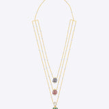 14K gold necklace with layered Polki, pearls, emeralds, rubies, and sapphires