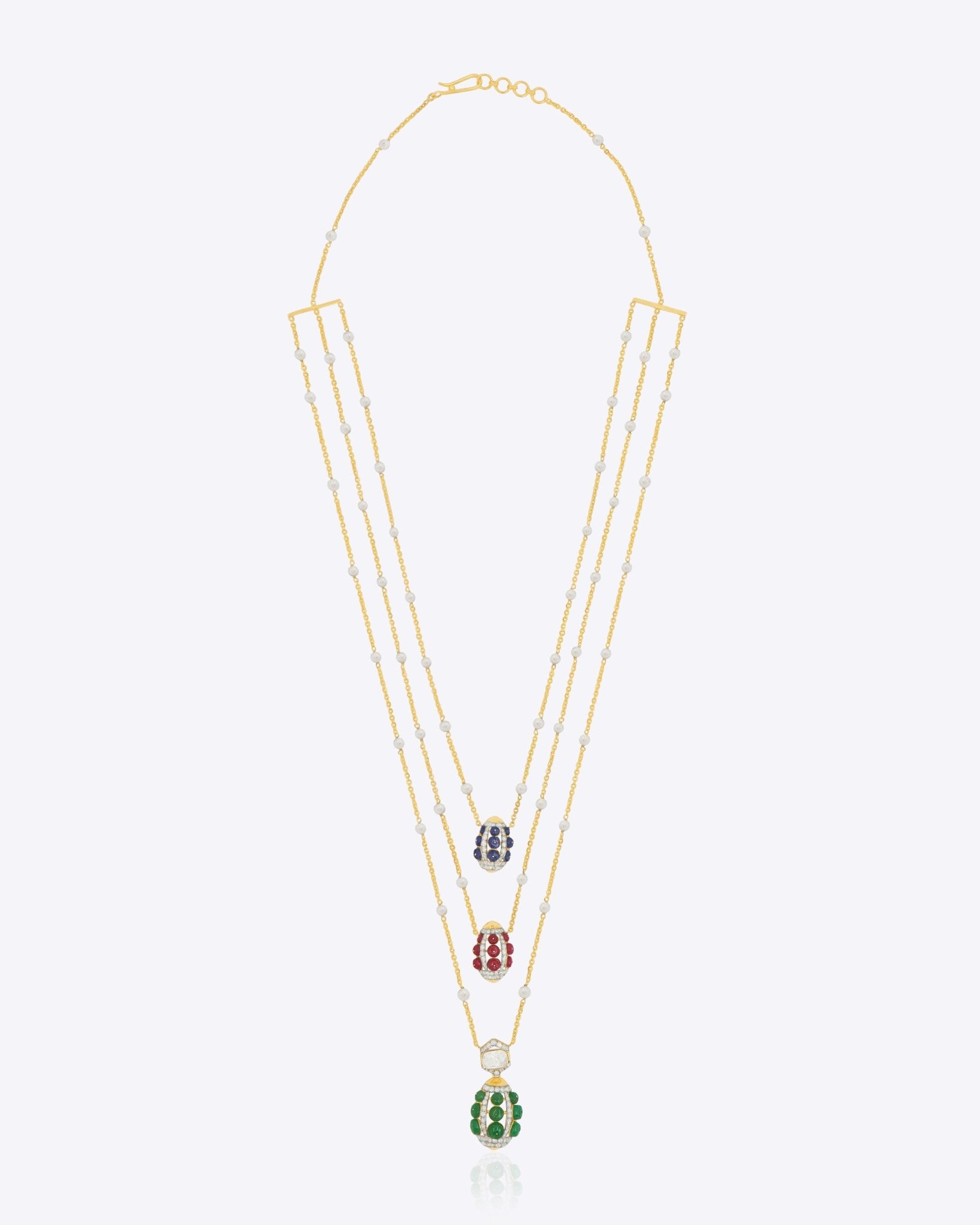 14K gold necklace with layered Polki, pearls, emeralds, rubies, and sapphires