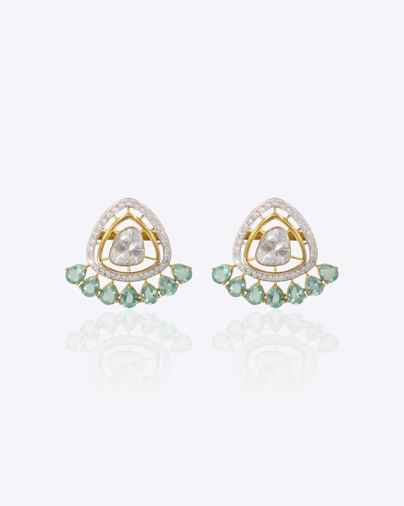 14K gold Ombrea stud earrings with Polki diamonds in a fluid, modern silhouette.