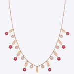 Pink Paradise Necklace in 18kt gold with ruby flowers and polki stones