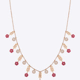 Pink Paradise Necklace in 18kt gold with ruby flowers and polki stones