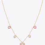 18K gold necklace with pink enamel hearts and Polki stones