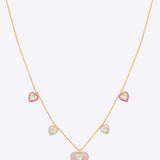 18K gold necklace with pink enamel hearts and Polki stones
