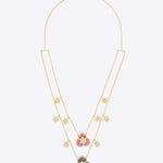 14k gold necklace with Polki floral motifs, pink and blue accents