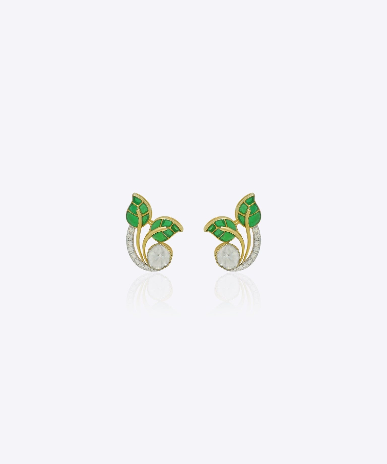 Nature inspired 9K gold earrings with emerald leaf detailing and luminous Polki centerpiece