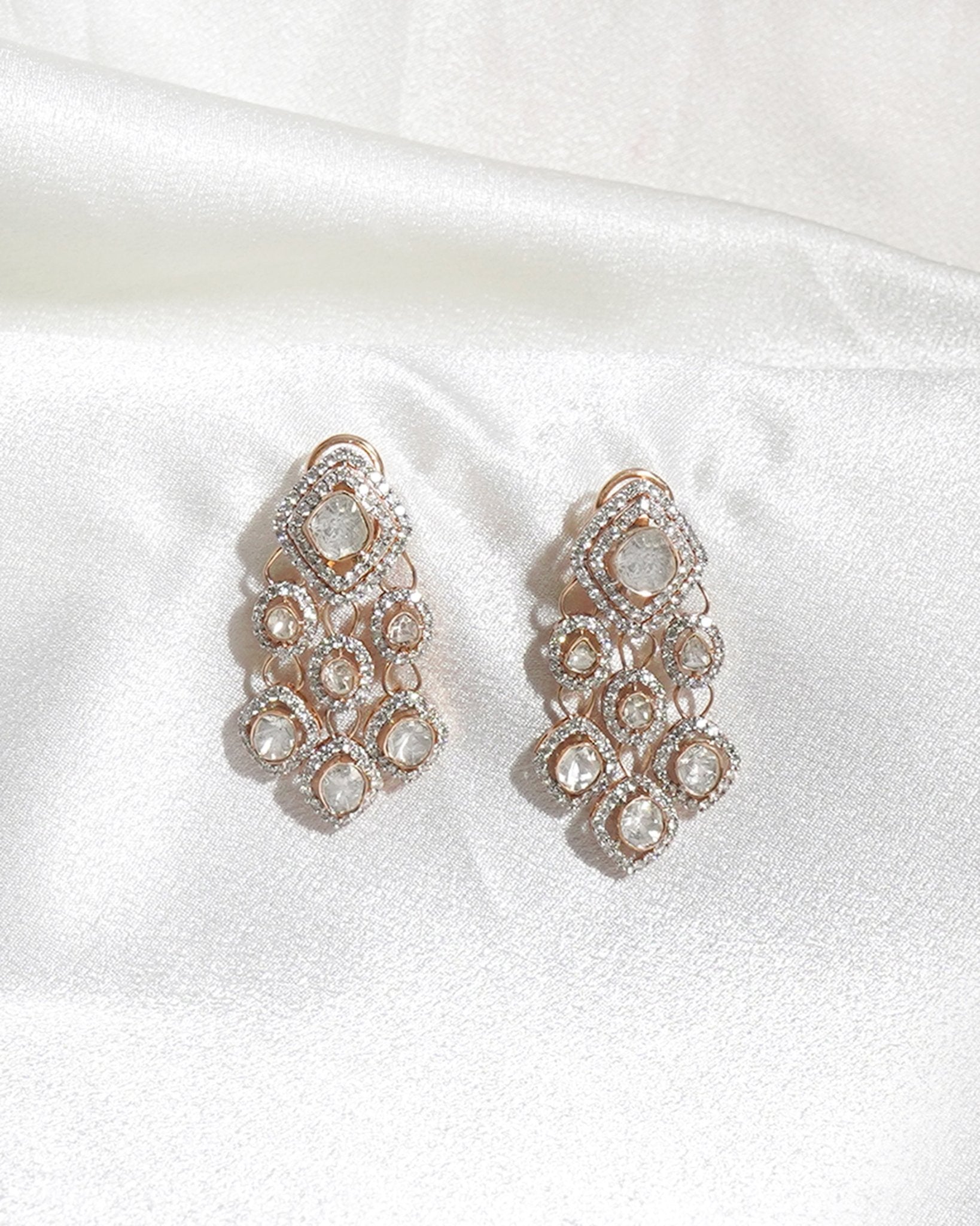 Sundown Flora Earrings in 18K gold with central Polki encircled by diamonds.
