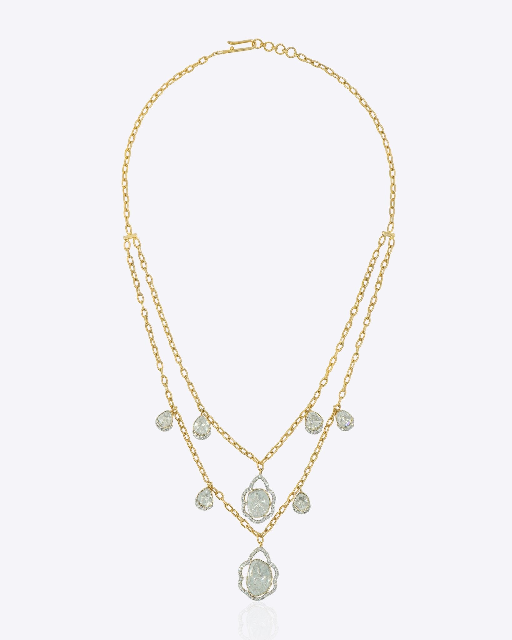 Layered 18K gold necklace with delicate, shimmering Polki droplets.