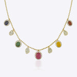 18K gold necklace with a graceful rhythmic design and a soft rosy tone.