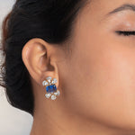 14K gold Noelle Bloom floral stud earrings with delicate detailing.