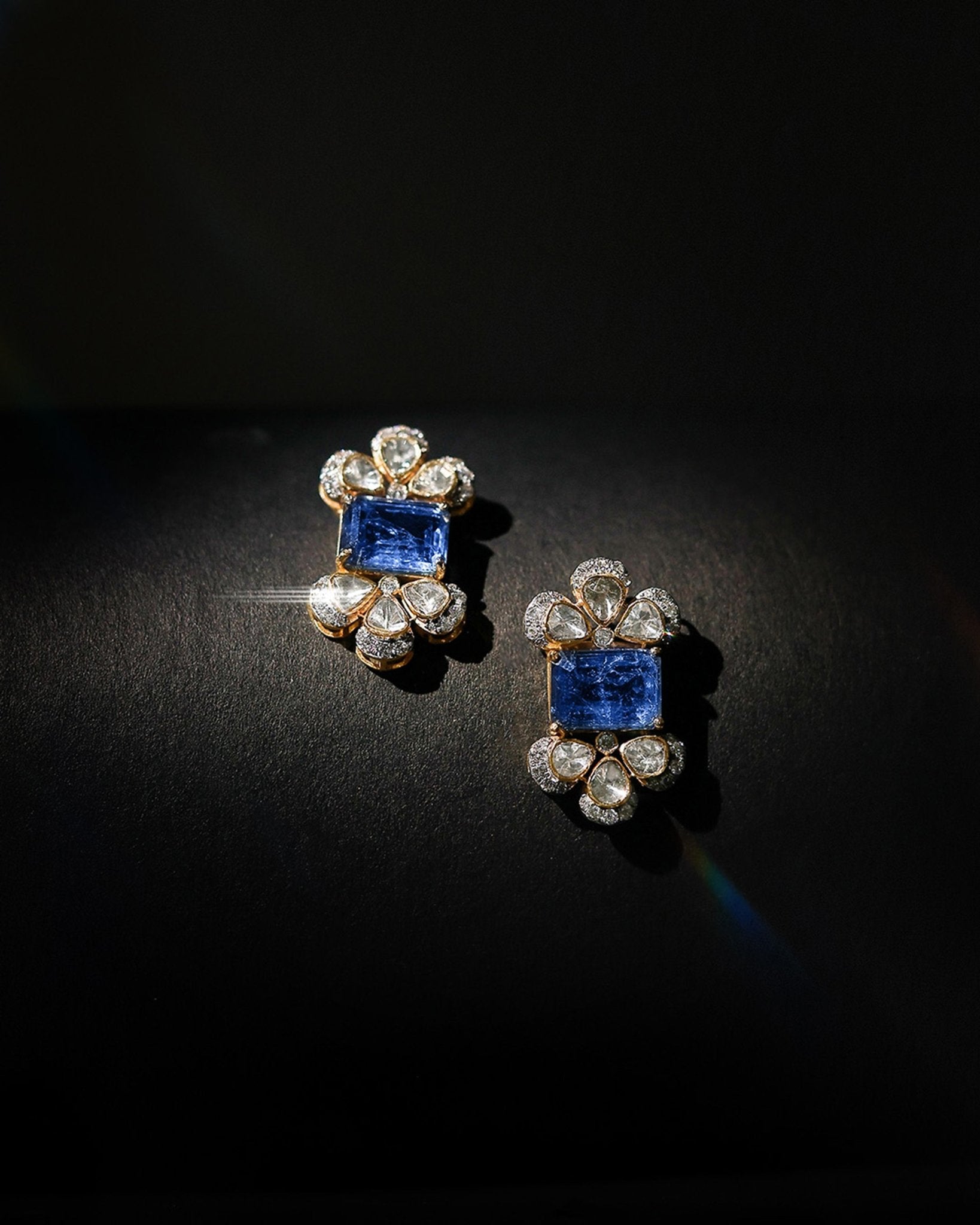 14K gold Noelle Bloom floral stud earrings with delicate detailing.